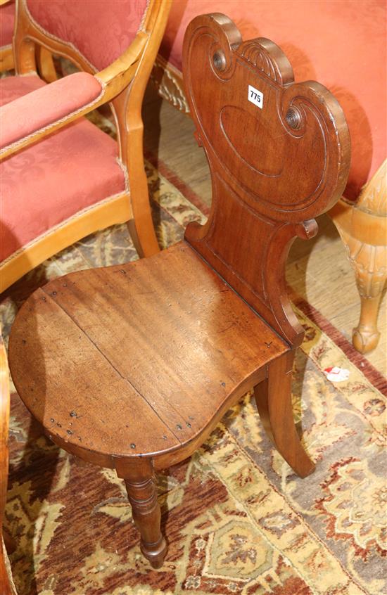 An early Victorian mahogany hall chair